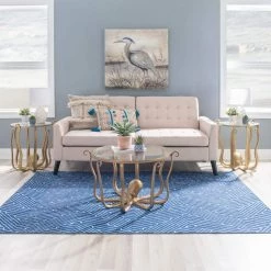 Okemo 31 W in. Gold Octopus Round Glass Top Coffee Table by Linon Home Decor -Linon Home Decor Shop gold linon home decor coffee tables hd221873 4f 1000