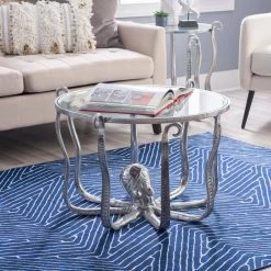 Okemo 31 W in. Silver Octopus Round Glass Top Coffee Table by Linon Home Decor 17 Okemo 31 W in. Silver Octopus Round Glass Top Coffee Table by Linon Home Decor -Linon Home Decor Shop silver linon home decor coffee tables hd221872 31 1000