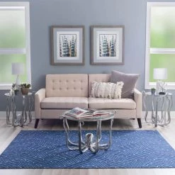 Okemo 31 W in. Silver Octopus Round Glass Top Coffee Table by Linon Home Decor 15 Okemo 31 W in. Silver Octopus Round Glass Top Coffee Table by Linon Home Decor -Linon Home Decor Shop silver linon home decor coffee tables hd221872 4f 1000