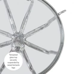 Okemo 31 W in. Silver Octopus Round Glass Top Coffee Table by Linon Home Decor 12 Okemo 31 W in. Silver Octopus Round Glass Top Coffee Table by Linon Home Decor -Linon Home Decor Shop silver linon home decor coffee tables hd221872 a0 1000